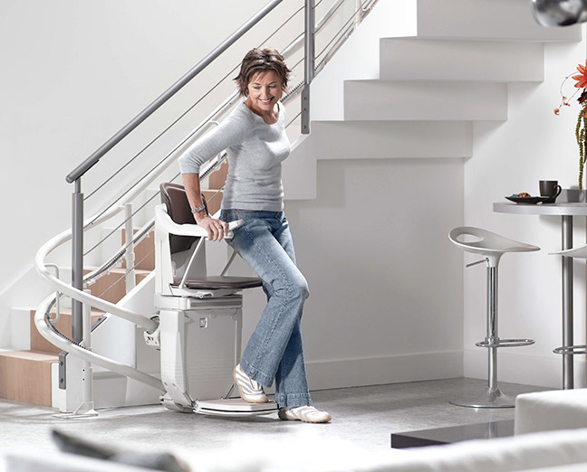 sit down on the stairlift chair model stannah solus